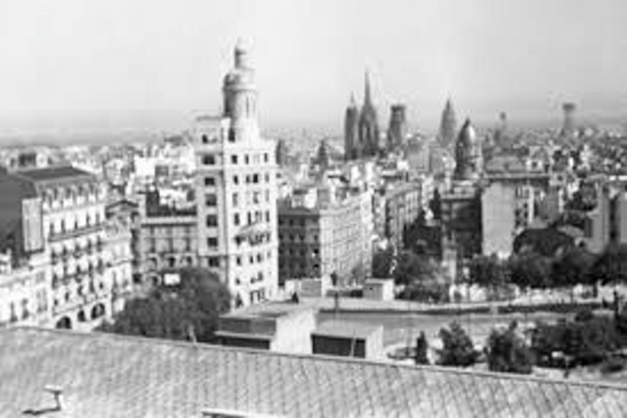 A black and white photo of a city skyline